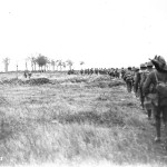 Canadians advancing through a German barrage. Advance East of Arras. September, 1918. Canada. Dept. of National Defence/Library and Archives Canada/PA-003130